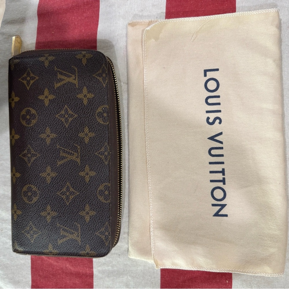 Louis Vuitton Brown and Gold Zippered Wallet. With checkbook slot